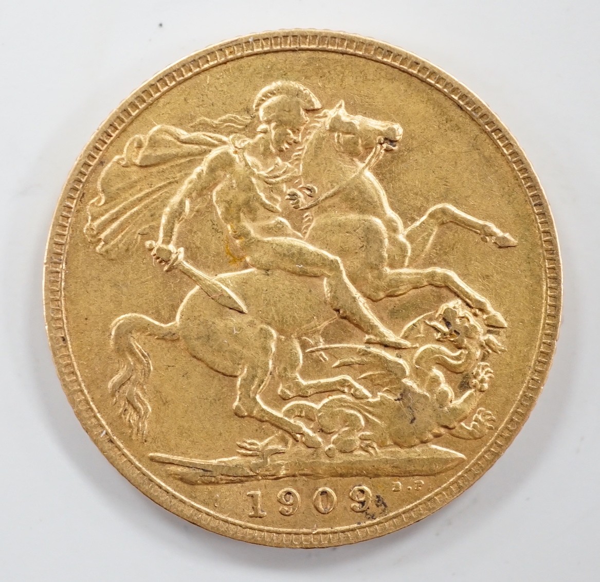 An Edward VII 1909 gold sovereign, good F.